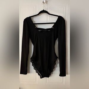 Beautiful black bodysuit by WIN WIN